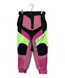 NIKE×AMBUSH（ナイキ×アンブッシュ）の古着「モーターサイクルパンツ」｜ピンク×ブラック