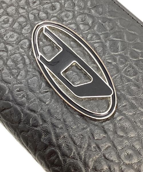 DIESEL（ディーゼル）DIESEL (ディーゼル) garnetラウンドジップウォレット/メタルロゴ長財布 ブラックの古着・服飾アイテム