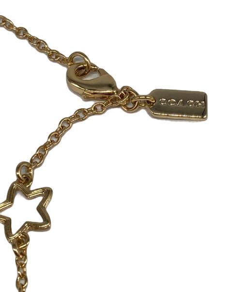 COACH（コーチ）COACH (コーチ) スターズ アンド ボウズ チョーカー ネックレスの古着・服飾アイテム