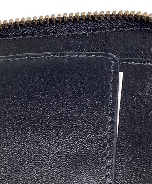COMME des GARCONS（コムデギャルソン）COMME des GARCONS (コムデギャルソン) ファットトータス二つ折り財 ブラックの古着・服飾アイテム