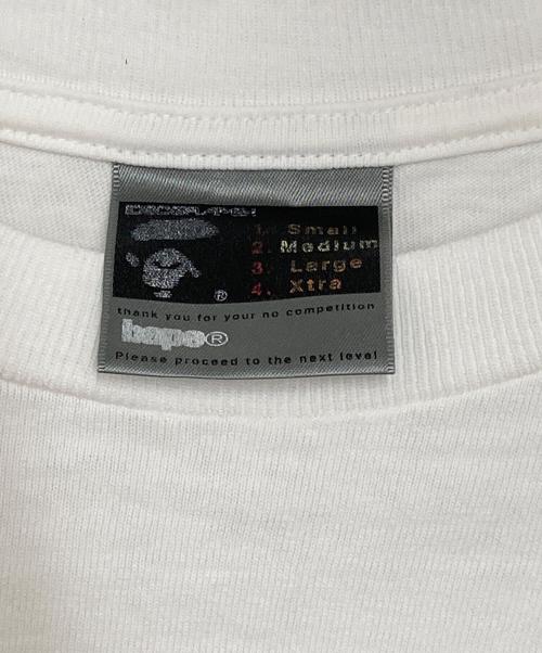 A BATHING APE（ア ベイシング エイプ）A BATHING APE (ア ベイシング エイプ) カモ柄ロゴプリントTシャツ ホワイト サイズ:Mの古着・服飾アイテム