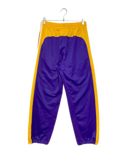 adidas（アディダス）adidas (アディダス) NBA (エヌビーエー) トラックパンツ パープル×イエロー サイズ:Mの古着・服飾アイテム
