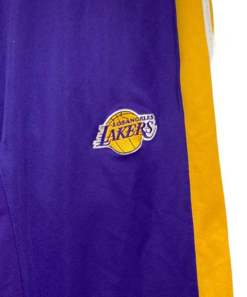 adidas（アディダス）adidas (アディダス) NBA (エヌビーエー) トラックパンツ パープル×イエロー サイズ:Mの古着・服飾アイテム