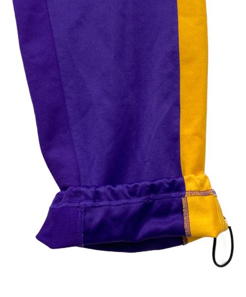 adidas（アディダス）adidas (アディダス) NBA (エヌビーエー) トラックパンツ パープル×イエロー サイズ:Mの古着・服飾アイテム