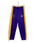 adidas（アディダス）の古着「トラックパンツ」｜パープル×イエロー