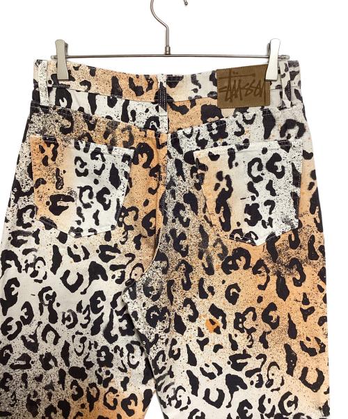 stussy（ステューシー）stussy (ステューシー) STENCIL CANVAS BIG OL JEANS オレンジ×ホワイト サイズ:W30の古着・服飾アイテム