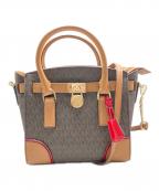 MICHAEL KORSマイケル・コース）の古着「モノグラム2WAYバッグ」｜ブラウン