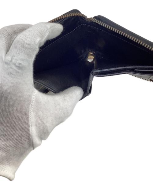 COMME des GARCONS（コムデギャルソン）COMME des GARCONS (コムデギャルソン) ラウンドジップウォレット ブラックの古着・服飾アイテム