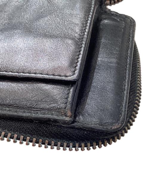 COMME des GARCONS（コムデギャルソン）COMME des GARCONS (コムデギャルソン) ラウンドジップウォレット ブラックの古着・服飾アイテム