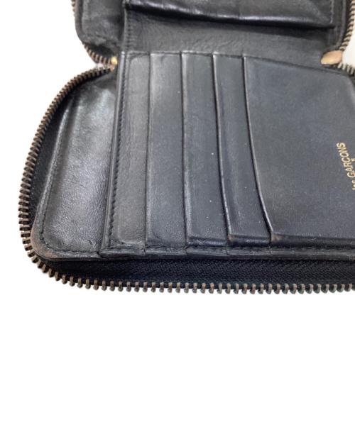 COMME des GARCONS（コムデギャルソン）COMME des GARCONS (コムデギャルソン) ラウンドジップウォレット ブラックの古着・服飾アイテム