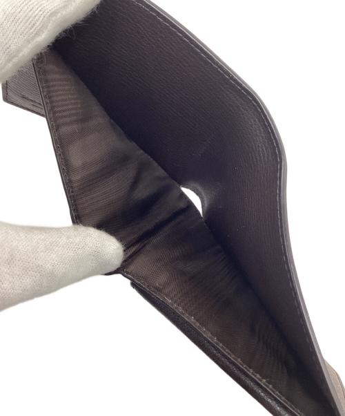 Salvatore Ferragamo（サルヴァトーレ フェラガモ）Salvatore Ferragamo (サルヴァトーレ フェラガモ) 2つ折り財布 ダークブラウンの古着・服飾アイテム