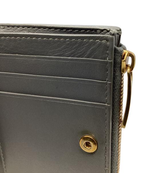 BOTTEGA VENETA（ボッテガベネタ）BOTTEGA VENETA (ボッテガベネタ) 2つ折り財布 グレーの古着・服飾アイテム