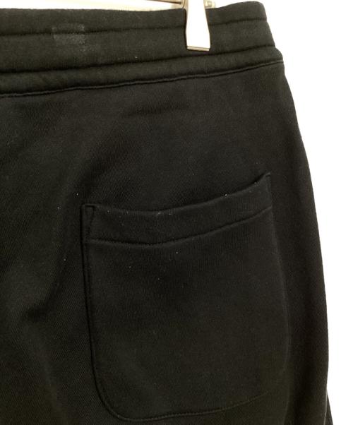 The Ennnoy Professional（ザ エンノイ プロフェッショナル）The Ennnoy Professional (ザ エンノイ プロフェッショナル) NETFLIX (ネットフリックス) スウェットパンツ ブラック×レッド サイズ:Lの古着・服飾アイテム