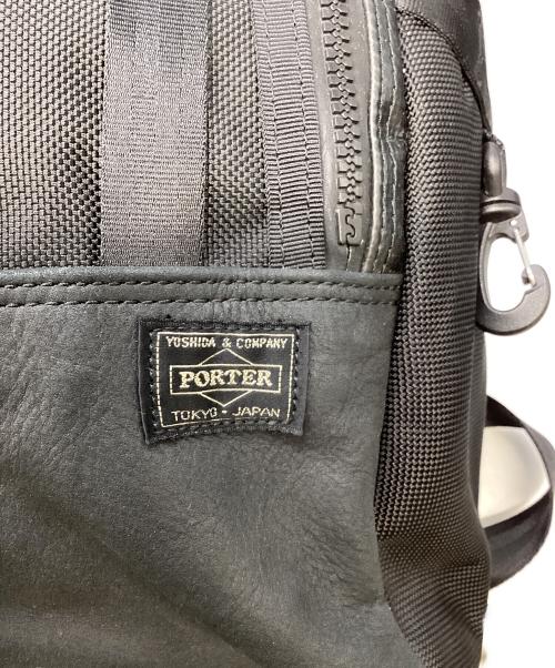 ISAORA（イサオラ）ISAORA (イサオラ) PORTER (ポーター) バックパック ブラック×ネイビーの古着・服飾アイテム