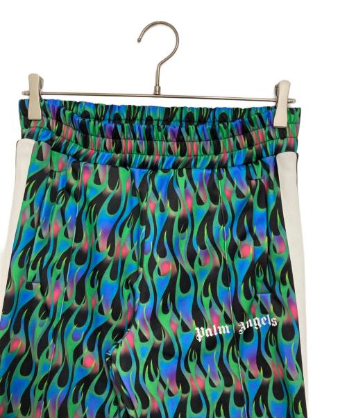 Palm Angels（パーム エンジェルス）Palm Angels (パーム エンジェルス) バーニング柄トラックパンツ グリーン×ブルー サイズ:Mの古着・服飾アイテム