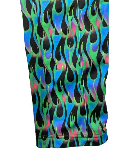 Palm Angels（パーム エンジェルス）Palm Angels (パーム エンジェルス) バーニング柄トラックパンツ グリーン×ブルー サイズ:Mの古着・服飾アイテム