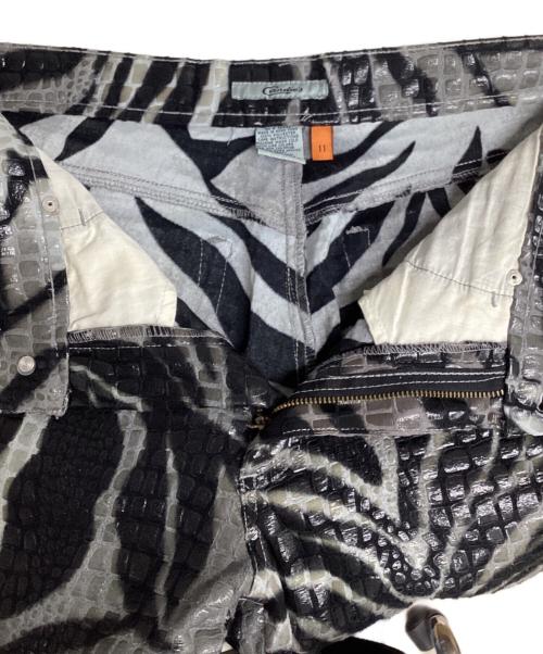 CANDIES（キャンディーズ）CANDIES (キャンディーズ) 総柄コーティングフレアパンツ グレー×ブラック サイズ:11の古着・服飾アイテム