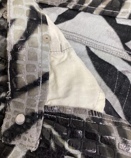 CANDIES（キャンディーズ）CANDIES (キャンディーズ) 総柄コーティングフレアパンツ グレー×ブラック サイズ:11の古着・服飾アイテム