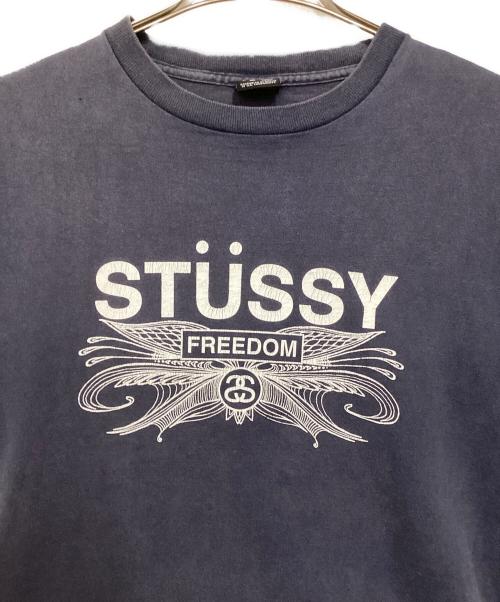 stussy（ステューシー）stussy (ステューシー) FREEDOM プリントTシャツ ネイビー サイズ:Mの古着・服飾アイテム