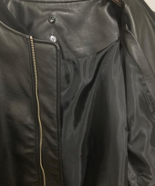 DUALISM（デュアリズム）DUALISM (デュアリズム) BOOMERANG LOGO 2WAY MA-1 HOOD JKT ブラック サイズ:FREEの古着・服飾アイテム