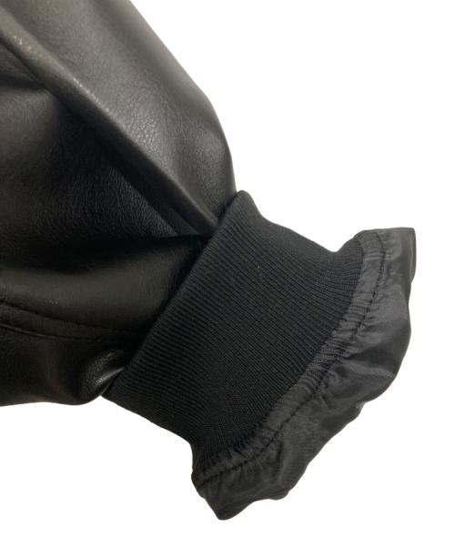 DUALISM（デュアリズム）DUALISM (デュアリズム) BOOMERANG LOGO 2WAY MA-1 HOOD JKT ブラック サイズ:FREEの古着・服飾アイテム