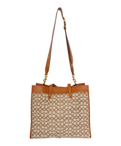 COACH（コーチ）COACH (コーチ) DISNEY (ディズニー) フィールド トート 40・シグネチャー テキスタイル ジャカード・パッチ ブラウン×ベージュの古着・服飾アイテム