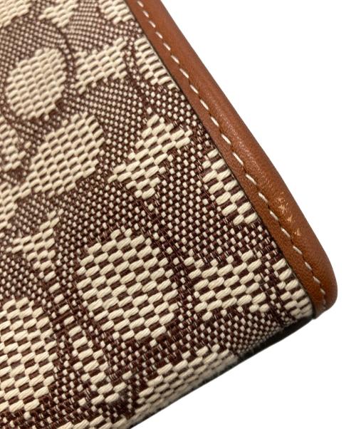 COACH（コーチ）COACH (コーチ) DISNEY (ディズニー) フィールド トート 40・シグネチャー テキスタイル ジャカード・パッチ ブラウン×ベージュの古着・服飾アイテム