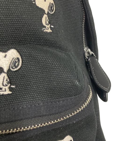 COACH（コーチ）COACH (コーチ) PEANUTS (ピーナッツ) カーゴ バックパック・スヌーピー プリント ブラックの古着・服飾アイテム