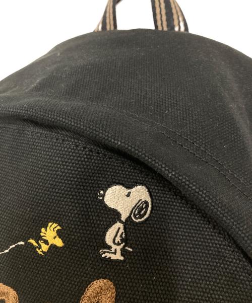 COACH（コーチ）COACH (コーチ) PEANUTS (ピーナッツ) カーゴ バックパック・スヌーピー プリント ブラックの古着・服飾アイテム