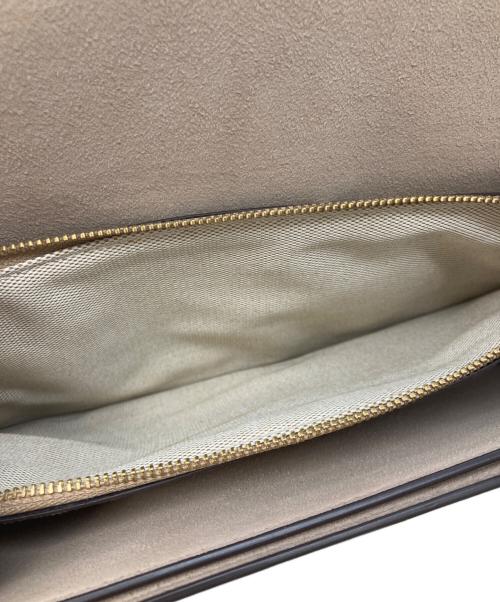 COACH（コーチ）COACH (コーチ) PEANUTS (ピーナッツ) タビー ショルダー バッグ 26・ニュースペーパー プリント ベージュの古着・服飾アイテム