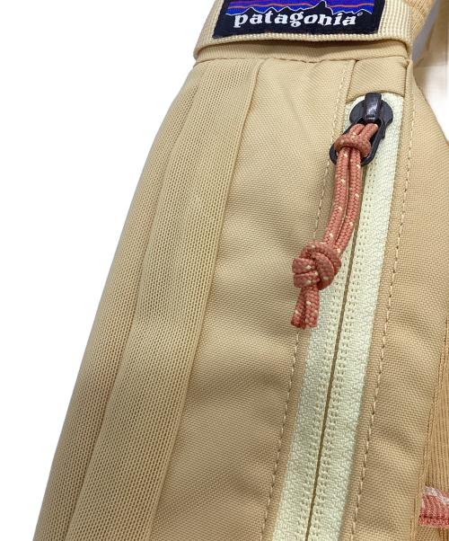 Patagonia（パタゴニア）Patagonia (パタゴニア) アトム・スリングバッグ ベージュの古着・服飾アイテム