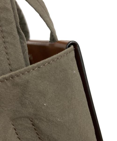 Acne studios（アクネ ストゥディオス）ACNE STUDIOS (アクネ ストゥディオス) Papery nylon tote 2way bag ブラウン×カーキの古着・服飾アイテム