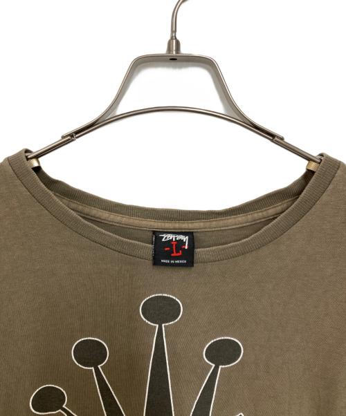 stussy（ステューシー）stussy (ステューシー) クラウンマンTシャツ カーキ サイズ:Ｌの古着・服飾アイテム