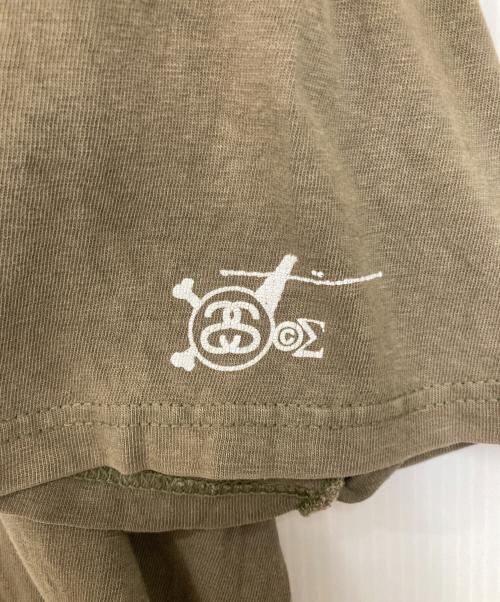 stussy（ステューシー）stussy (ステューシー) クラウンマンTシャツ カーキ サイズ:Ｌの古着・服飾アイテム