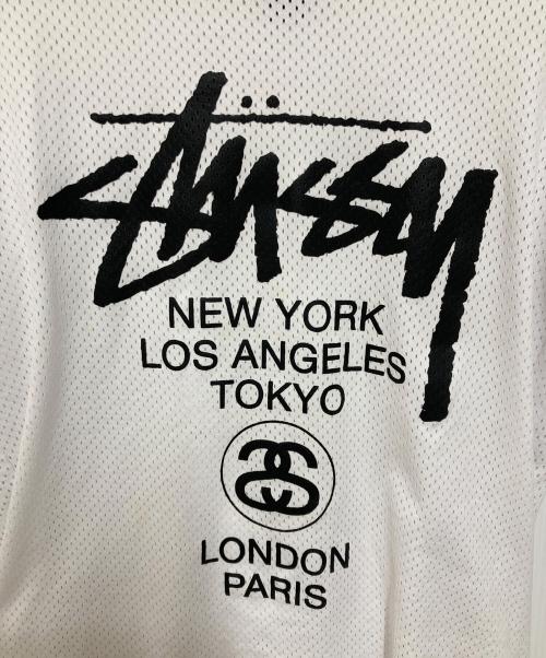 stussy（ステューシー）stussy (ステューシー) 90’ｓ ワールドツアーメッシュカットソー ホワイト サイズ:Ｍの古着・服飾アイテム