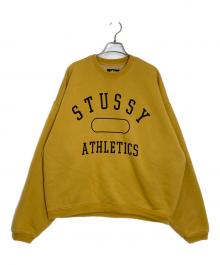 stussy（ステューシー）の古着「アーチロゴスウェット」｜イエロー