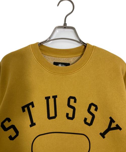 stussy（ステューシー）stussy (ステューシー) アーチロゴスウェット イエロー サイズ:Lの古着・服飾アイテム