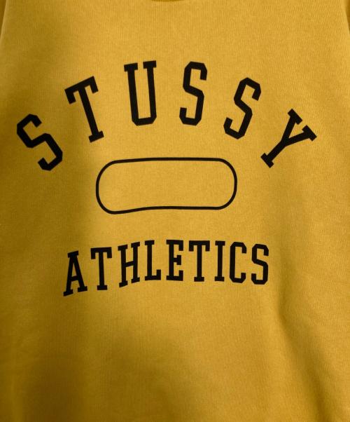 stussy（ステューシー）stussy (ステューシー) アーチロゴスウェット イエロー サイズ:Lの古着・服飾アイテム