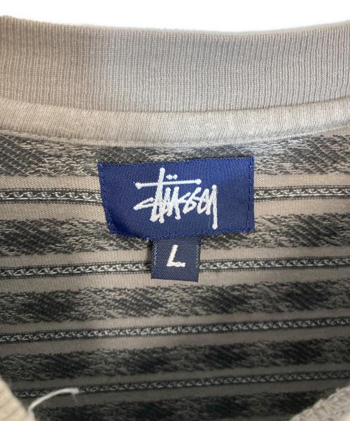 stussy（ステューシー）stussy (ステューシー) スカルボーダーTシャツ グレー サイズ:Lの古着・服飾アイテム
