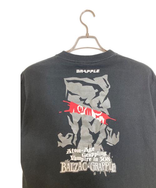 UNITED SPORTS HEADLINE（ユナイテッドスポーツヘッドライン）United Sports Headline (ユナイテッドスポーツヘッドライン) プリントTシャツ ブラック サイズ:Mの古着・服飾アイテム