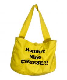 Hombre Nino（オンブレニーニョ）の古着「ニュースペーパーバッグ」｜イエロー