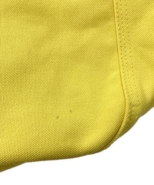 Hombre Nino（オンブレニーニョ）Hombre Nino (オンブレニーニョ) ニュースペーパーバッグ イエローの古着・服飾アイテム