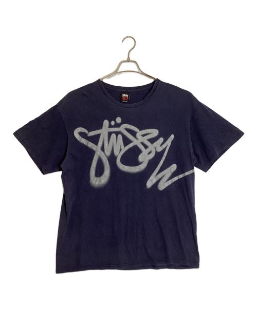 stussy（ステューシー）stussy (ステューシー) スプレーロゴプリントTシャツ ネイビー サイズ:XLの古着・服飾アイテム