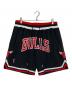 MITCHELL & NESS（ミッチェルアンドネス）の古着「BASKETBALL SHORTS/バスケットボール ショーツ」｜ブラック×レッド
