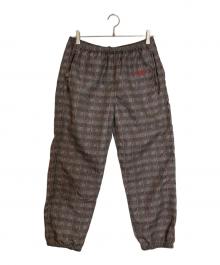 SUPREME（シュプリーム）の古着「Glen Check Track Pant」｜ベージュ×レッド