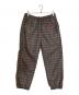 SUPREME（シュプリーム）の古着「Glen Check Track Pant」｜ベージュ×レッド