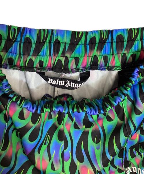 Palm Angels（パーム エンジェルス）Palm Angels (パーム エンジェルス) バーニングフレア柄 サイドライン イージートラックパンツ ブルー×グリーン サイズ:Mの古着・服飾アイテム