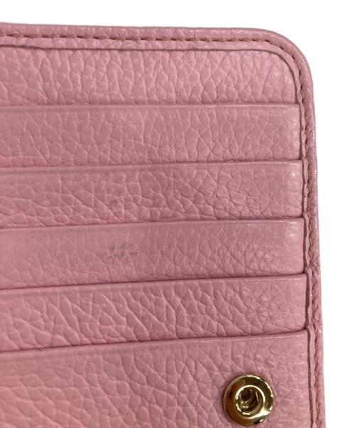 JIMMY CHOO（ジミーチュウ）JIMMY CHOO (ジミーチュウ) スタッズウォレット 折りたたみ財布 ピンクの古着・服飾アイテム