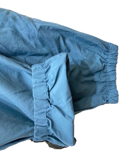 UNIVERSAL PRODUCTS.（ユニバーサルプロダクツ）UNIVERSAL PRODUCTS. (ユニバーサルプロダクツ) NYLON SHELL TRACK PANTS/ナイロンシェルトラックパンツ ブルー サイズ:3の古着・服飾アイテム