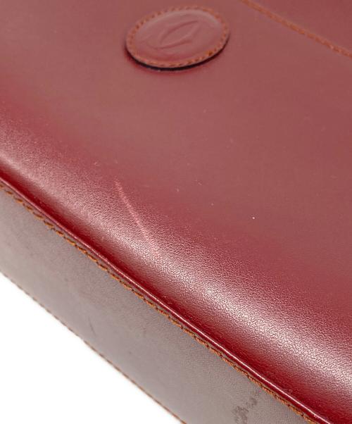 Cartier（カルティエ）Cartier (カルティエ) クラッチバッグ レッドの古着・服飾アイテム